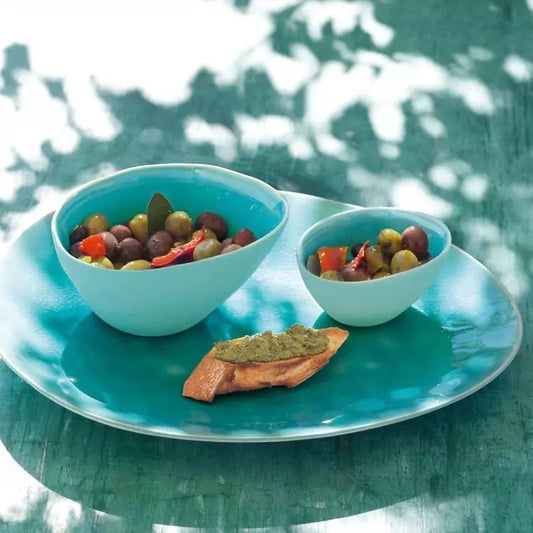 Eclectic ASA Selection A La Plage turquoise ceramic bowls and plate with olives and bread on a rustic table