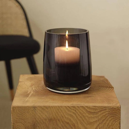 Eclectic ASA Selection Ajana smoky grey mouth-blown glass candle holder and vase on a wooden block