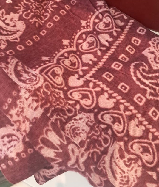 Eclectic burgundy wool blend scarf featuring a cream oversized bandana paisley print with soft woven texture