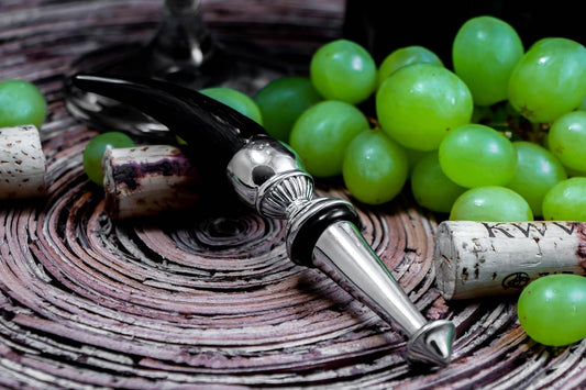 Eclectic Diana Carmichael Impondo Zulu bottle stopper with ebony resin horn handle and silver pewter detailing.