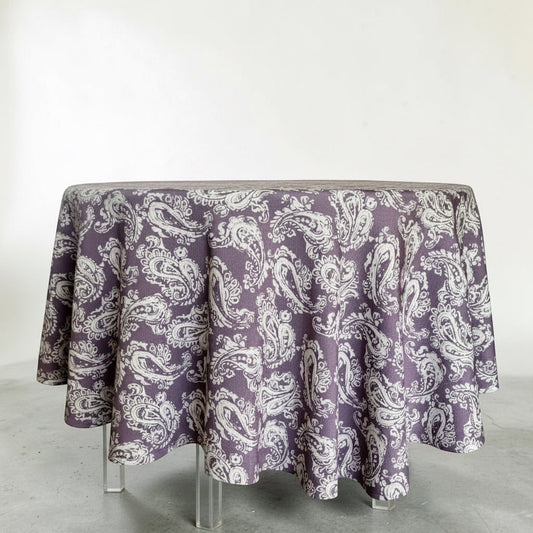 Eclectic dusty plum round tablecloth with a white paisley pattern and a seamless linen-look finish.