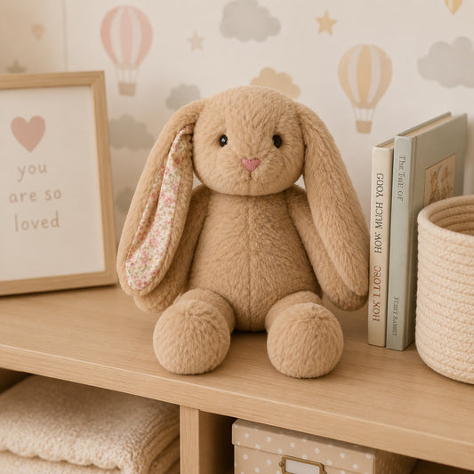 Eclectic Peluche brown plush bunny with long floppy ears featuring a delicate floral lining and embroidered pink nose.