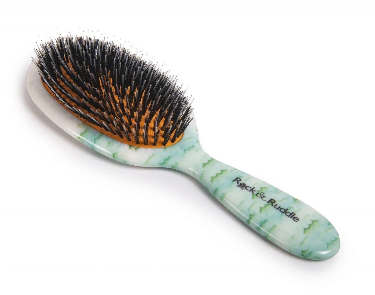 Eclectic Rock & Ruddle High Seas baby hairbrush with natural boar bristles and a green nautical patterned handle.