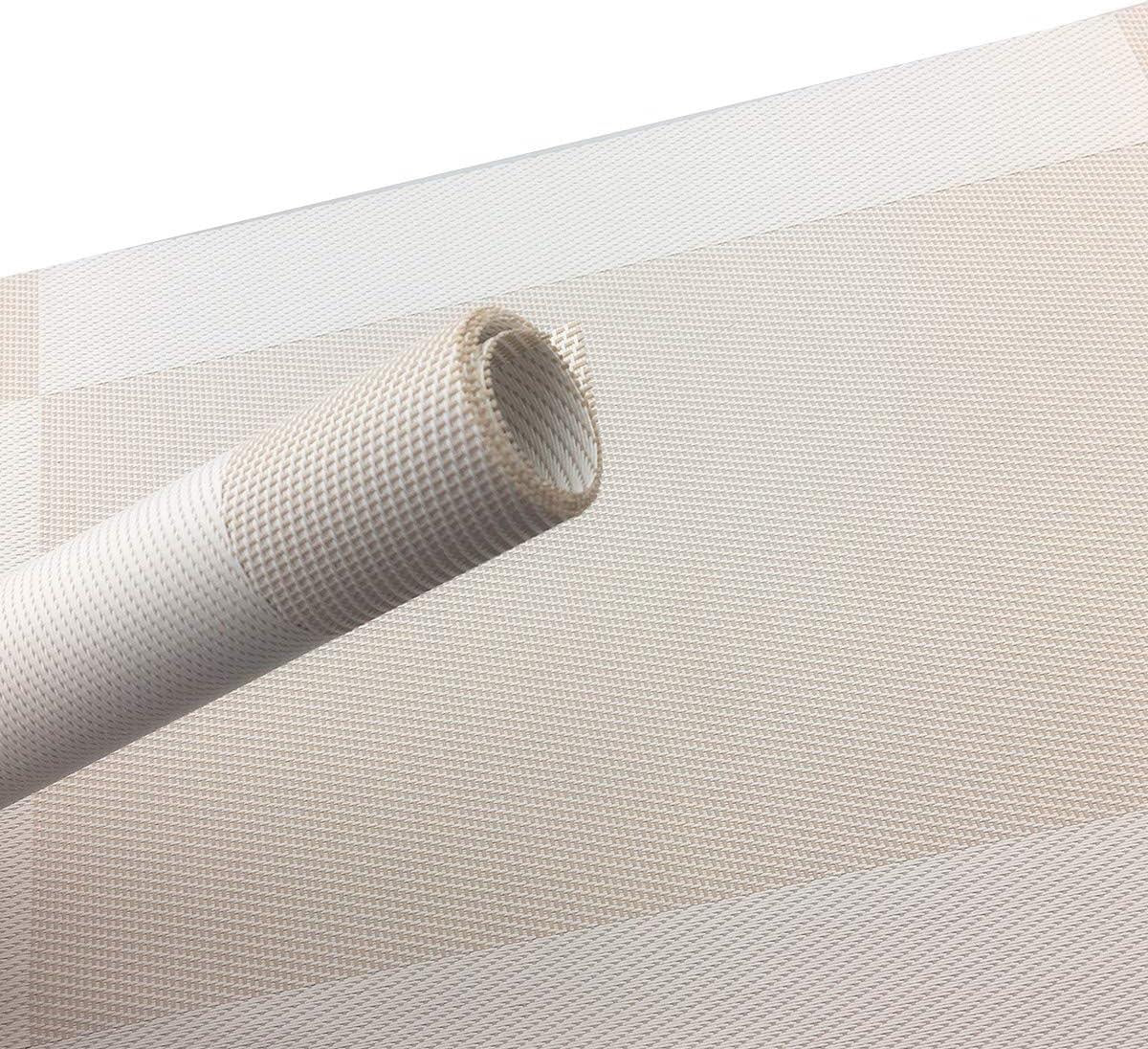 Eclectic sand-coloured rectangular woven PVC placemats with a subtle textured finish for a refined table setting.
