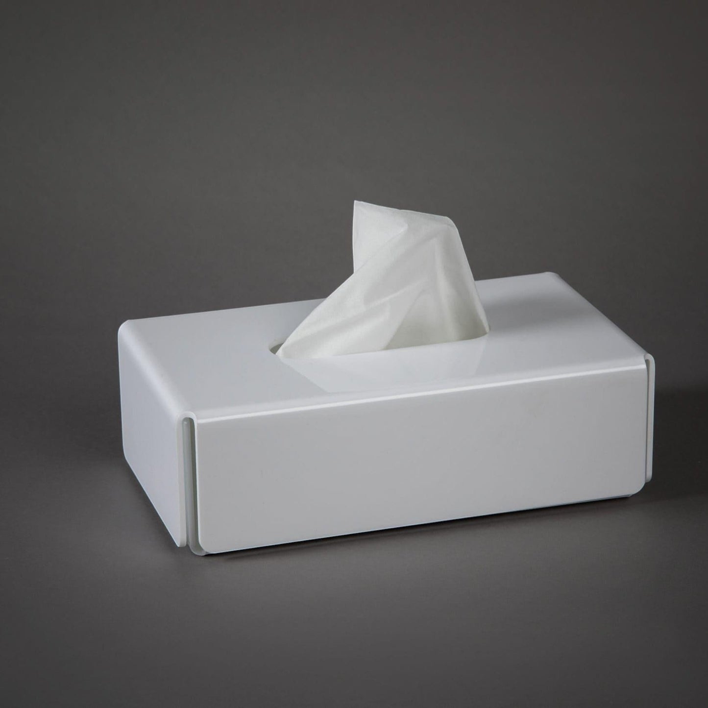 Eclectic modern rectangular white acrylic tissue box cover with a sleek minimalist design on a grey background