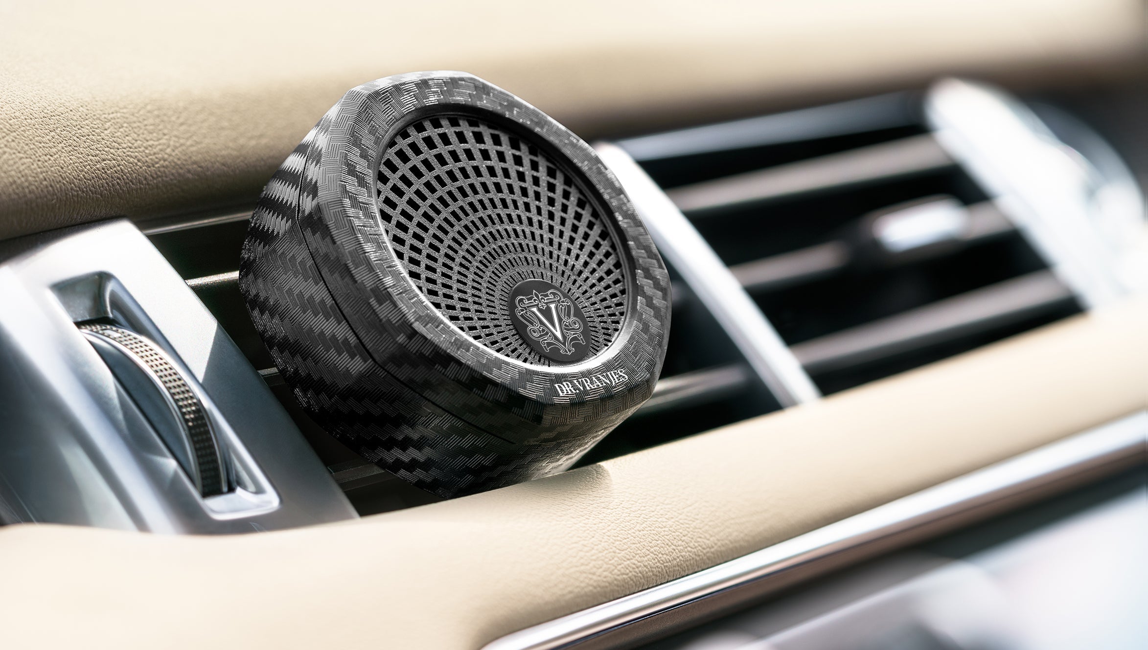 Dr Vranjes car fragrance diffuser attached to a car air vent.