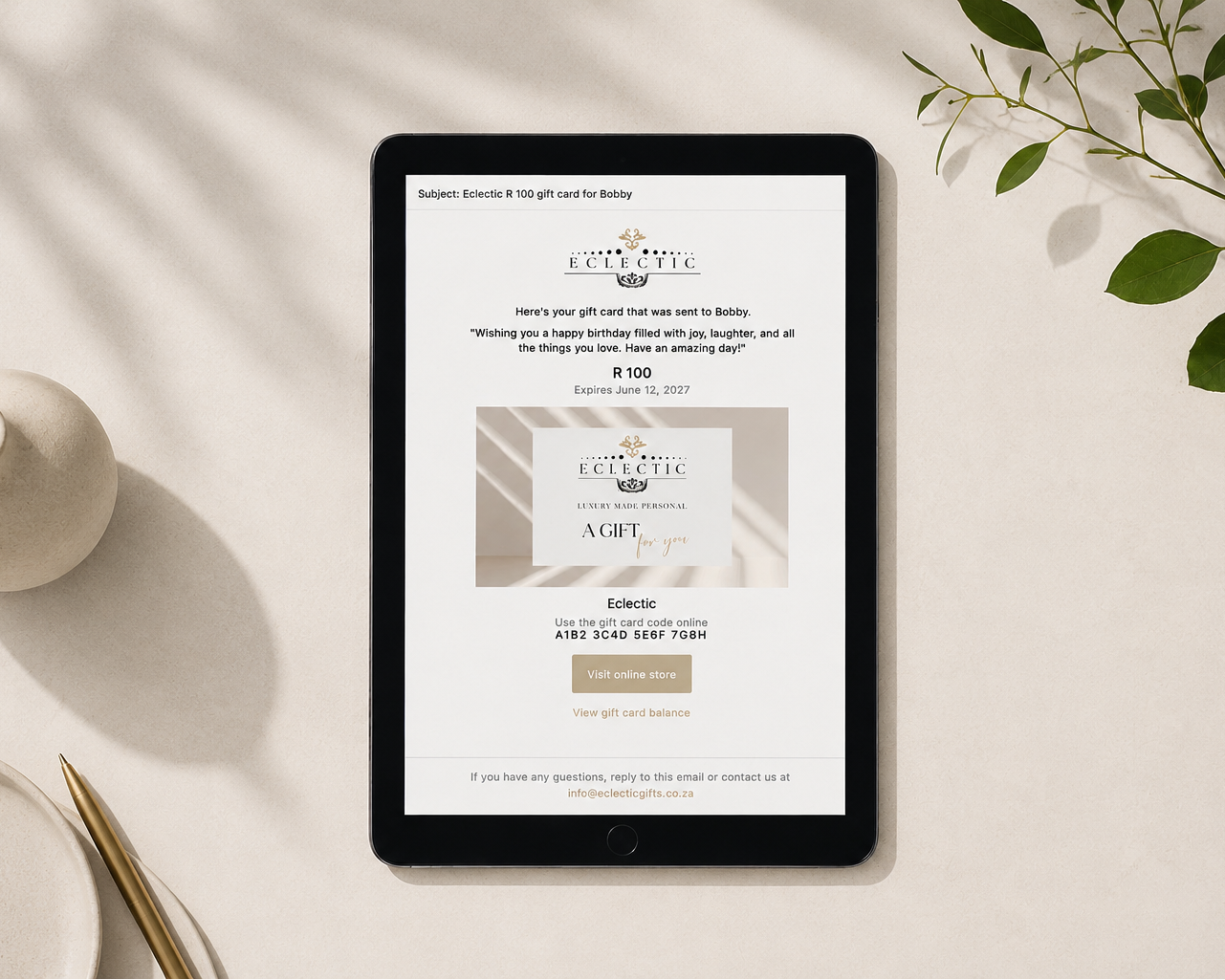 Digital gift certificate displayed on a tablet with a minimalistic background