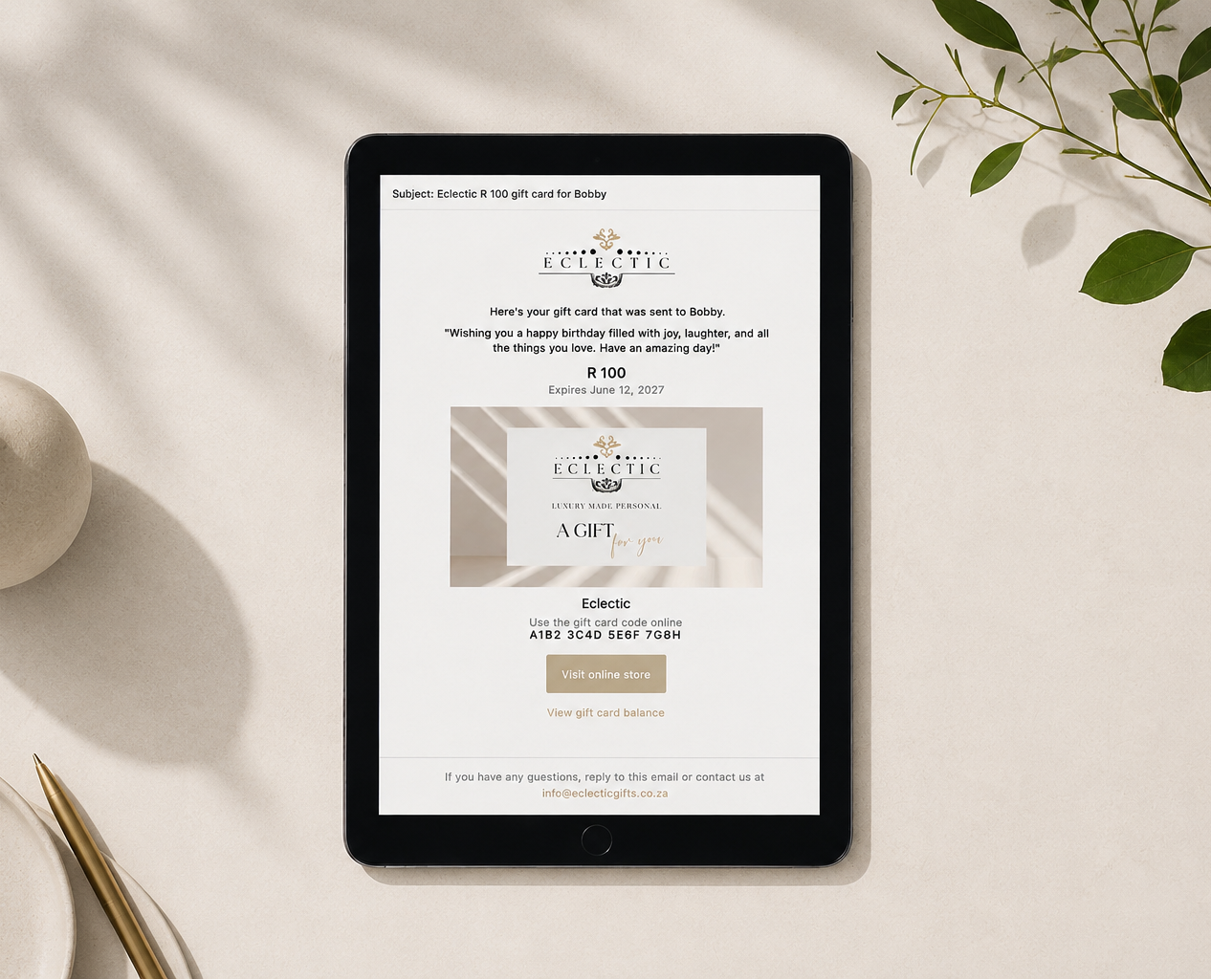 Digital gift certificate displayed on a tablet with a minimalistic background