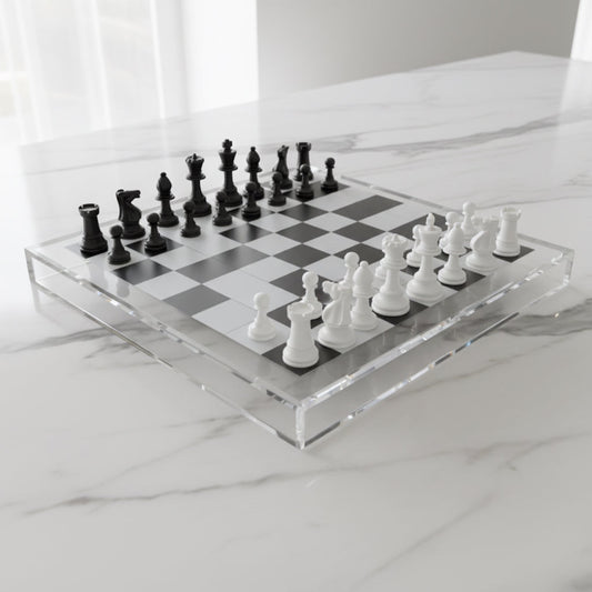 Eclectic 56cm modern acrylic chess board with black and white pieces on a marble surface