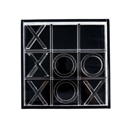 Eclectic modern acrylic noughts and crosses game set in sleek black and clear finish for coffee table decor