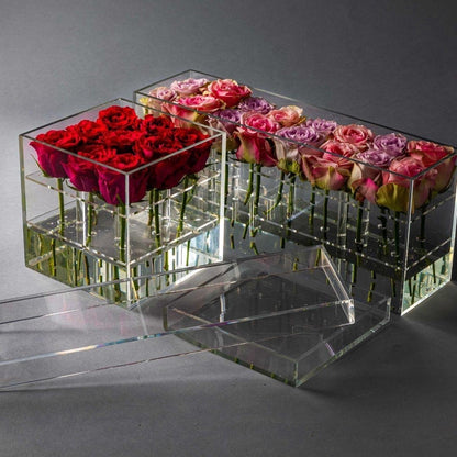 Eclectic Rose Box set featuring square and rectangular clear acrylic containers filled with red and pink roses.