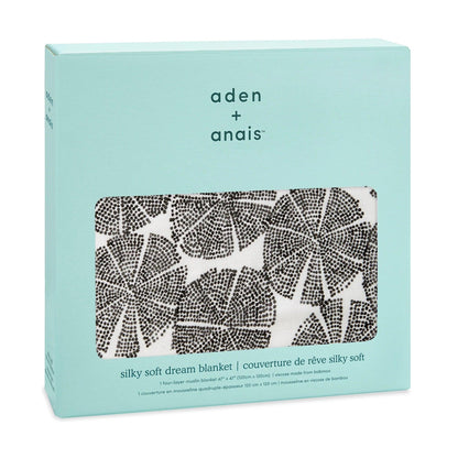 Eclectic Aden + Anais In Motion Wedges bamboo muslin dream blanket in its light blue gift box packaging.