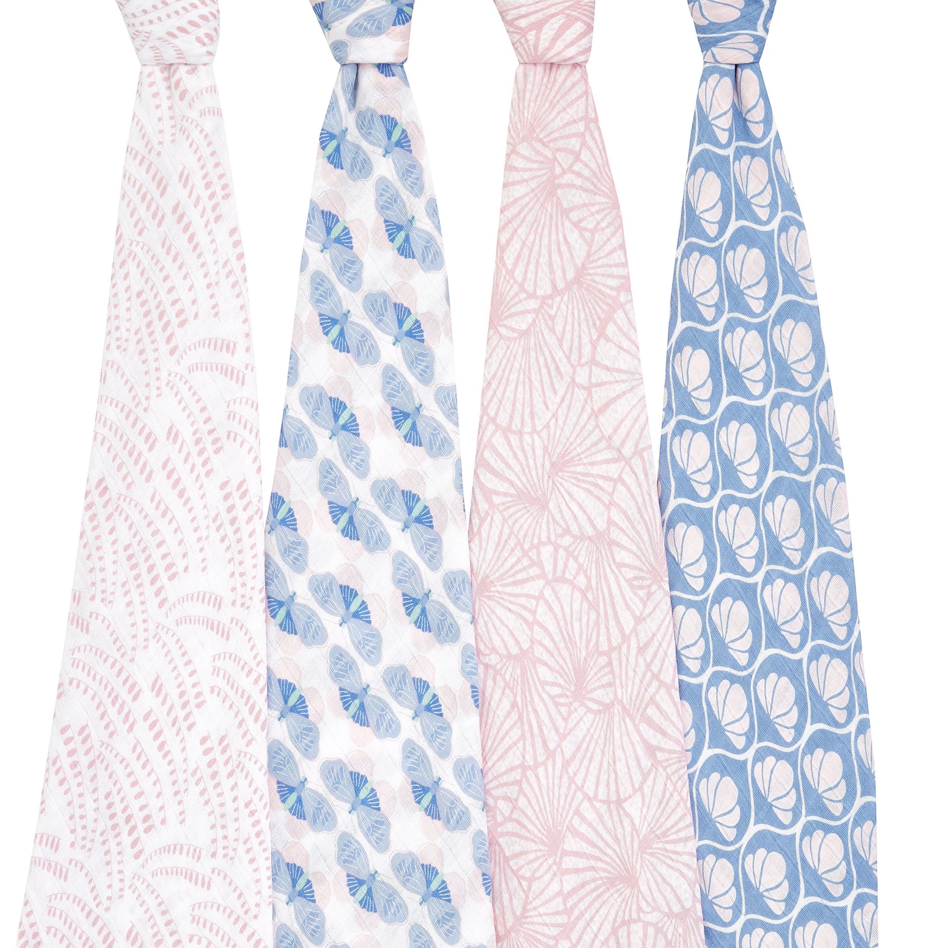 Eclectic Aden + Anais set of four Deco print cotton muslin swaddle blankets in soft pink and blue patterns.