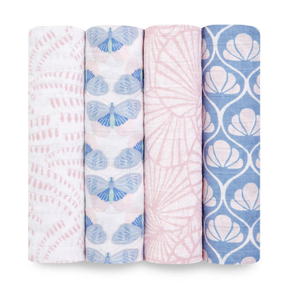 Eclectic Aden + Anais set of four cotton muslin swaddle blankets featuring blue and pink Deco patterns