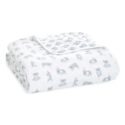 Eclectic Aden + Anais Now + Zen Dream Blanket in white cotton muslin with a grey koala print for babies.