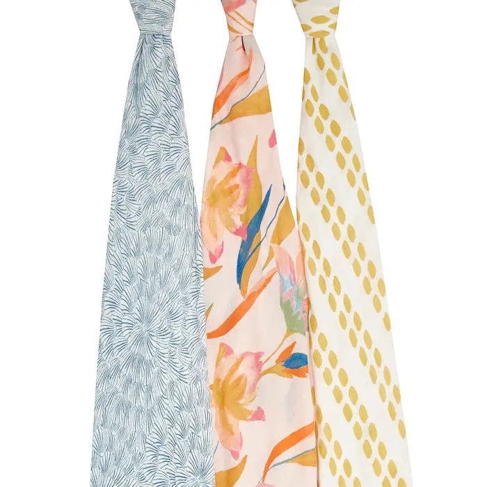 Eclectic aden + anais Marine Garden set of 3 silky soft bamboo muslin swaddles with floral and abstract patterns.