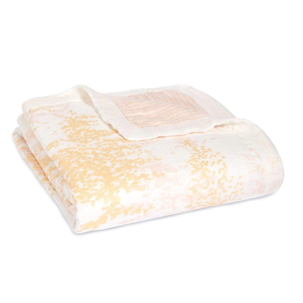 Eclectic Aden + Anais Metallic Primrose dream blanket in soft bamboo muslin with a delicate shimmering floral print.