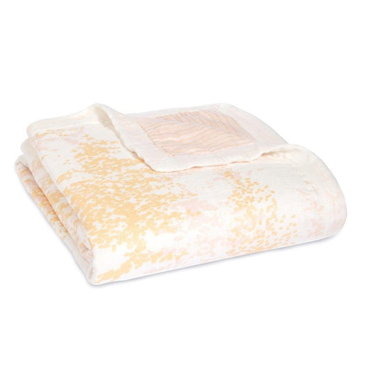 Eclectic Aden + Anais Metallic Primrose dream blanket in soft bamboo muslin with a delicate shimmering floral print.