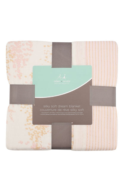 Eclectic Aden + Anais Metallic Primrose dream blanket in soft bamboo muslin with a delicate floral shimmer print.