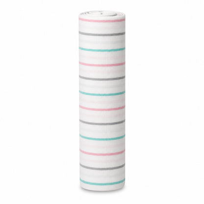 Eclectic Aden + Anais pastel stripe muslin cotton swaddle blanket rolled up on a white background.