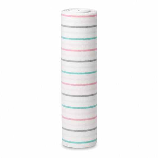 Eclectic Aden + Anais pastel stripe muslin cotton swaddle blanket rolled up on a white background.