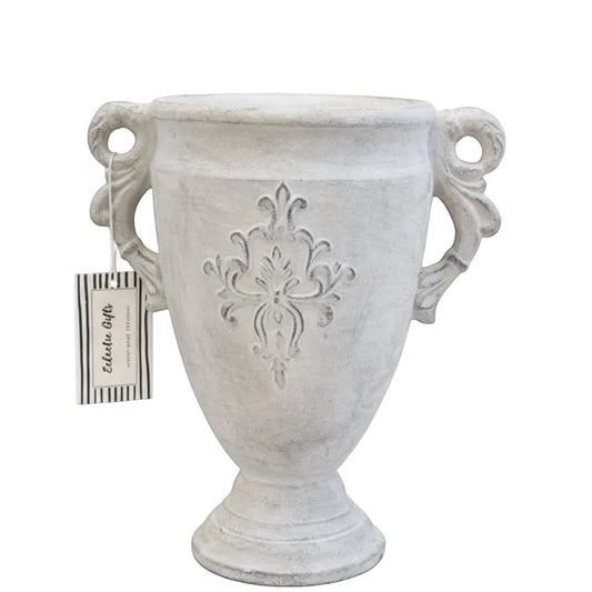 Eclectic antique cement trophy vase with ornate handles and a weathered white finish, 31cm tall.