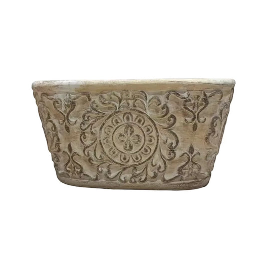 Eclectic antique oval cement herb planter with distressed patina finish and intricate European scrollwork detailing.