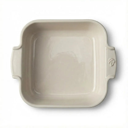 Eclectic Appolia square ceramic oven dish in ecru cream with ribbed handles, top-down view.