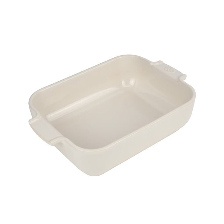 Eclectic Appolia rectangular ceramic oven dish in a smooth ecru glaze with wide ribbed handles for easy gripping.