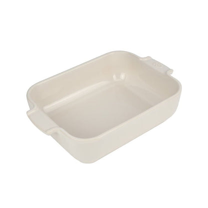 Eclectic Appolia rectangular ceramic oven dish in a smooth ecru glaze with wide ribbed handles for easy gripping.