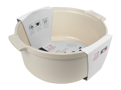 Eclectic Appolia 24 cm round ceramic soufflé dish in ecru with ergonomic handles and product information label