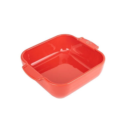 Eclectic Appolia square ceramic oven dish in a vibrant red glaze with wide ribbed handles for easy serving.