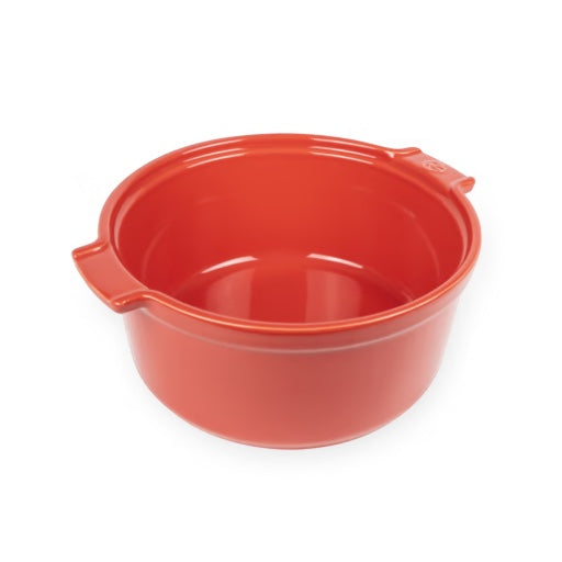 Eclectic Appolia 24cm round ceramic soufflé dish in a rich red glaze with ergonomic handles for oven-to-table serving.