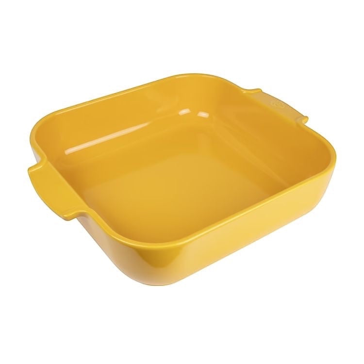 Eclectic Appolia square ceramic oven dish in vibrant saffron yellow with wide ribbed handles for easy serving.