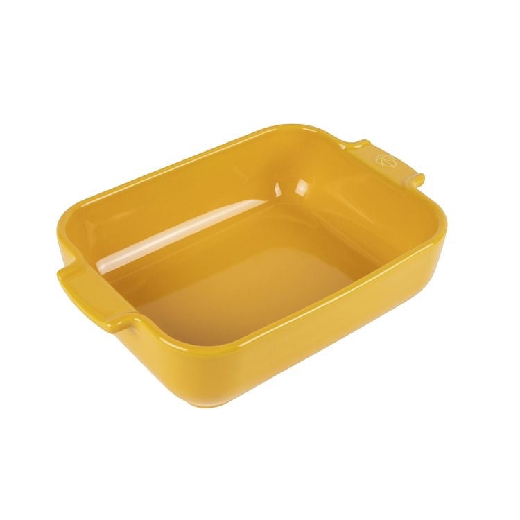 Eclectic Appolia saffron yellow rectangular ceramic oven dish with wide ribbed handles for easy serving.