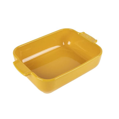 Eclectic Appolia saffron yellow rectangular ceramic oven dish with wide ribbed handles for easy serving.