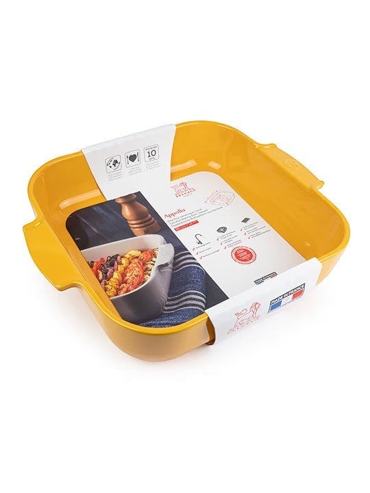 Eclectic Appolia square ceramic oven dish in vibrant saffron yellow with ribbed handles and product packaging label.