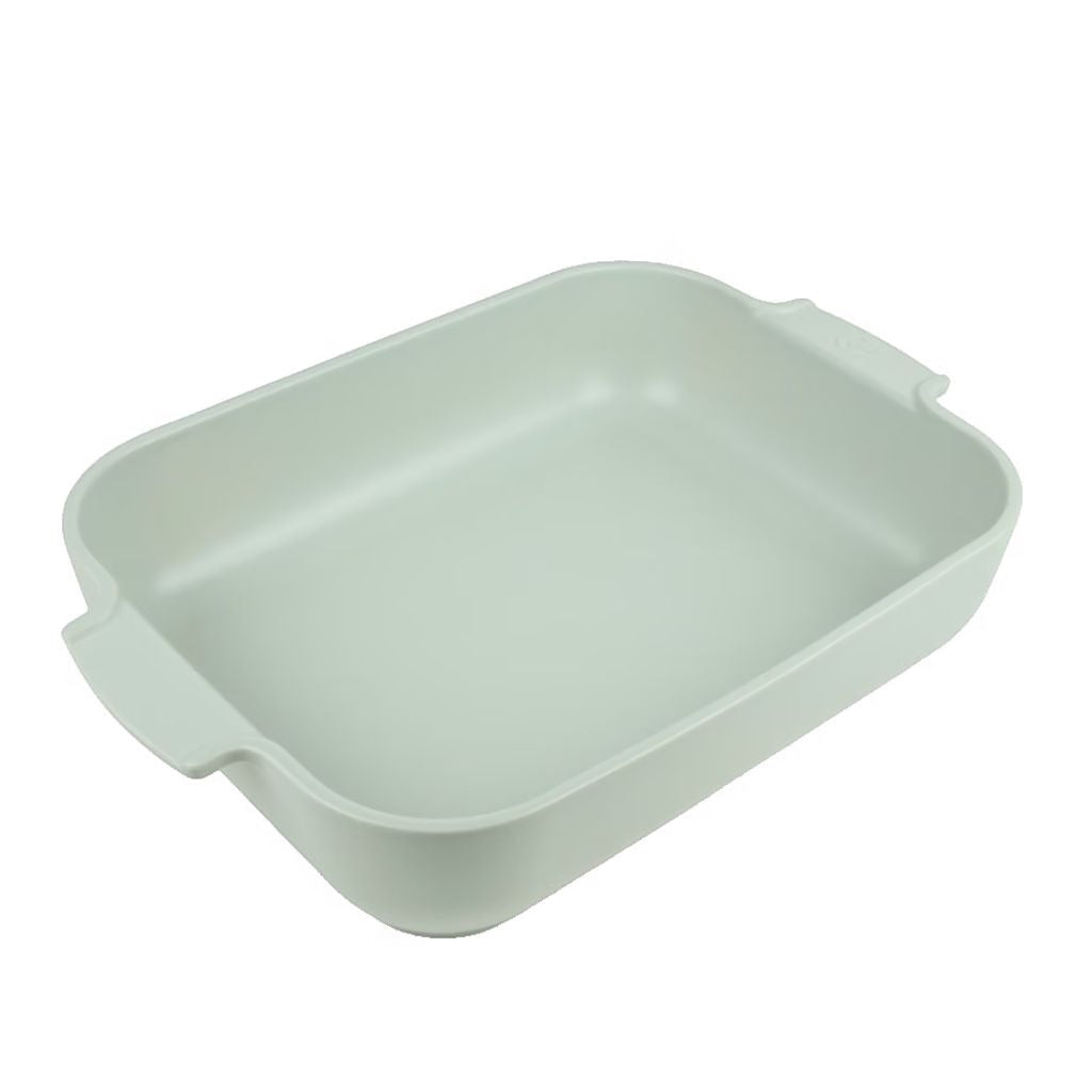 Eclectic Appolia rectangular ceramic oven dish in a soft sage green glaze with wide ribbed handles.