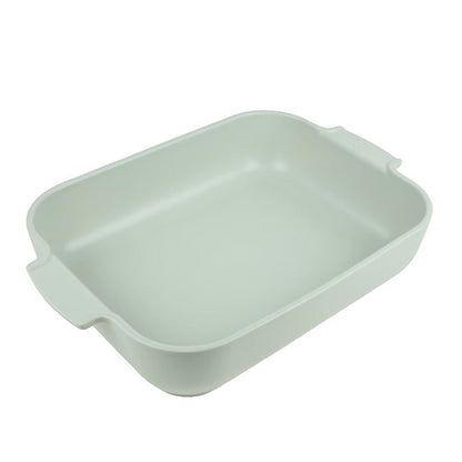Eclectic Appolia rectangular ceramic oven dish in a soft sage green glaze with wide ribbed handles.
