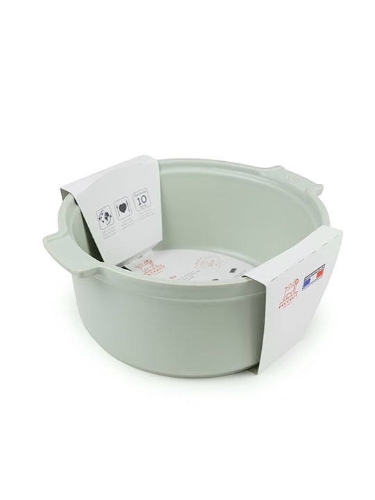 Eclectic Appolia sage green ceramic soufflé dish with ergonomic handles and tall sides for even baking