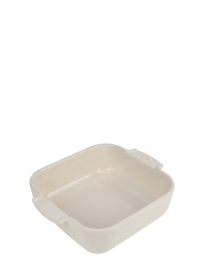 Eclectic Appolia square ceramic oven dish in ecru cream with ribbed handles for a secure grip.