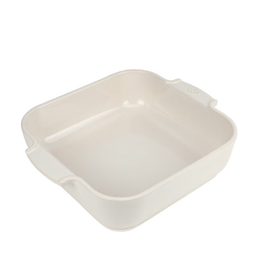 Eclectic Appolia square ceramic oven dish in ecru cream with ribbed handles for easy serving.