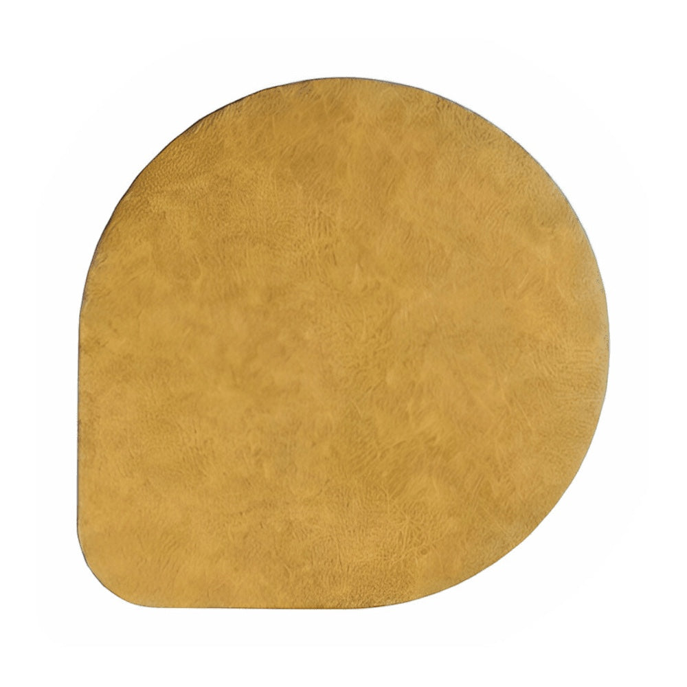Eclectic ASA Selection mustard vegan leather placemat with a matte finish and organic square shape.