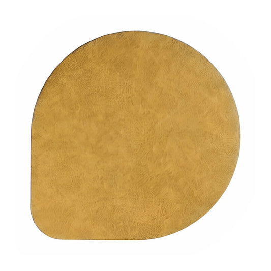 Eclectic ASA Selection mustard vegan leather placemat with a matte finish and organic square shape.