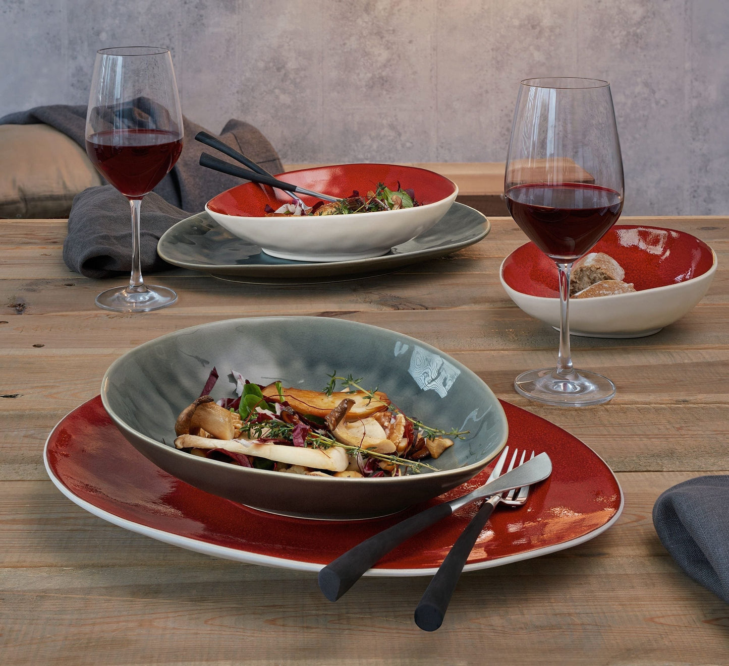Eclectic ASA Selection A La Maison oyster ceramic bowl with craquelure glaze on a rustic wooden table with salad