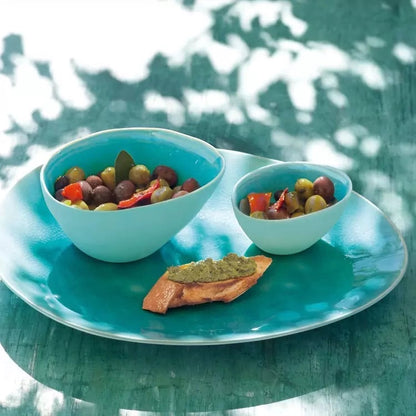 Eclectic ASA Selection A La Plage turquoise ceramic bowls and plate with olives and bread on a rustic table