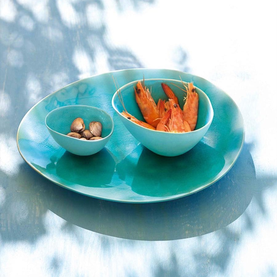 Eclectic ASA Selection A La Plage turquoise ceramic bowls with crackle glaze finish holding seafood on a matching tray