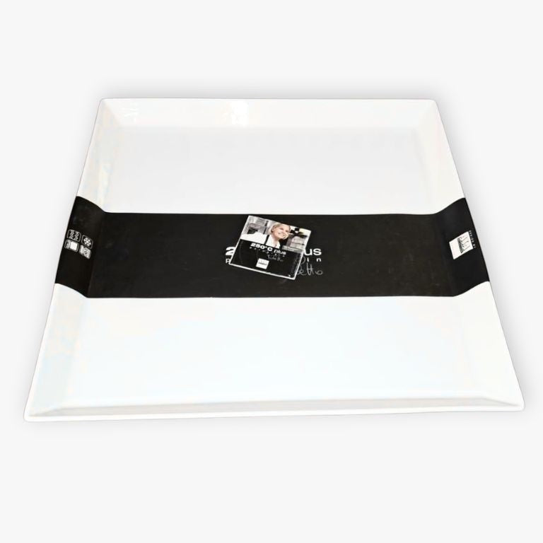 Eclectic ASA Selection 250°C Plus white square porcelain serving platter with a black promotional paper band.