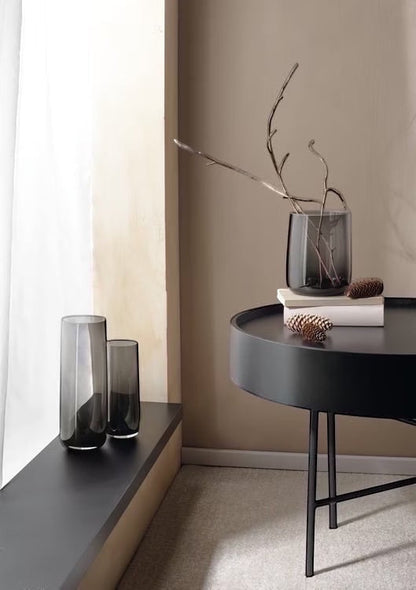 Eclectic ASA Selection Ajana smoky grey mouth-blown glass vases in a minimalist contemporary interior setting