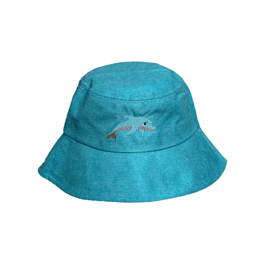 Eclectic Bantwana blue cotton bucket hat for kids featuring a playful embroidered dolphin design for sun protection.